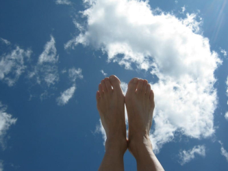 Yoga feet under a Tuscan sky
