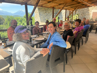 Group at long dinner table during the Mare a Mare trek in Corsica