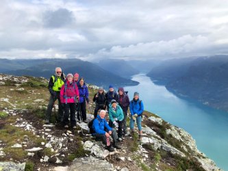 Group photo with view of fjord